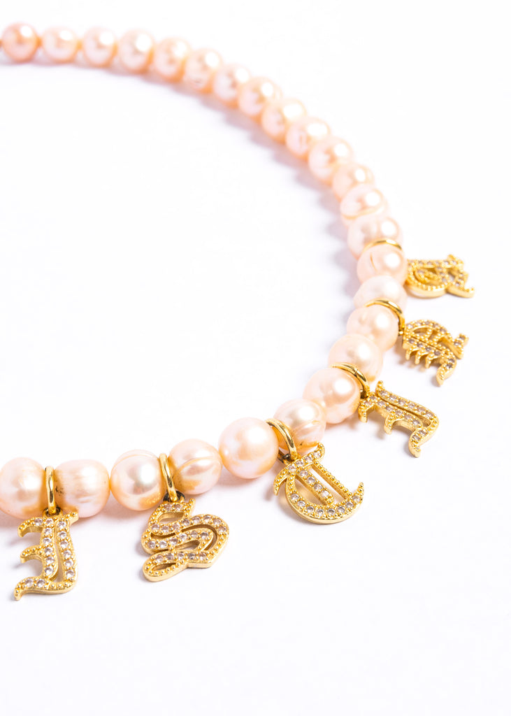 Mallory necklace - peach pearls